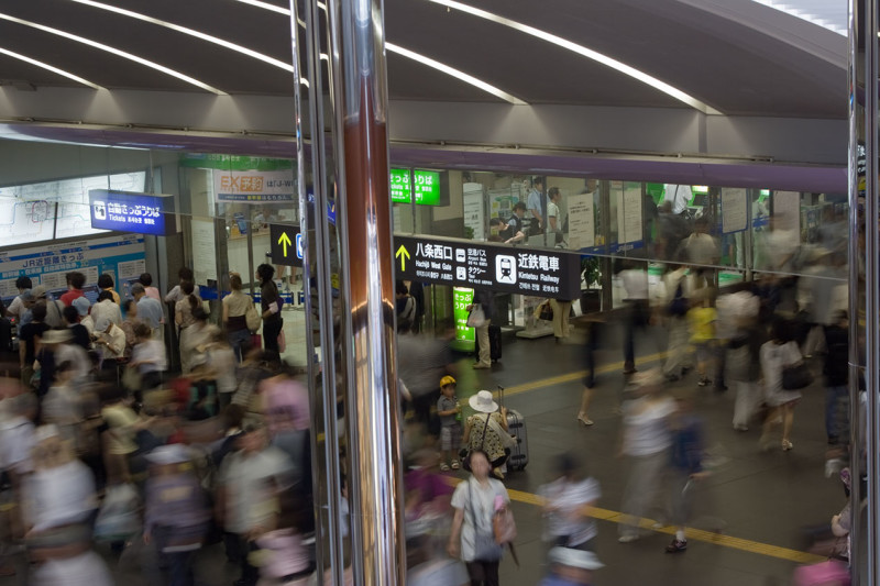 People in motion at Kyoto Train Station